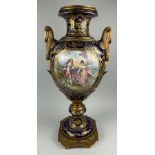 A LARGE SEVRES STYLE VASE CIRCA 1900 WITH BRASS MOUNTS, Painted one side with scene of a lady and