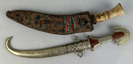 AN ISLAMIC BEADED KUKRI WITH BONE HANDLE ALONG WITH ANOTHER SIMILAR,