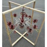 A BOHEMIAN RED CRYSTAL AND MURANO GLASS EIGHT ARM CHANDELIER, Some spare glass shades. 50cm drop
