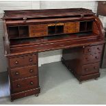 A LARGE 19TH CENTURY CUBAN MAHOGANY ROLL TOP DESK, The roll top opening to reveal a fitted