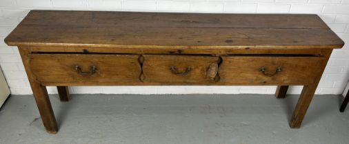 A 19TH CENTURY ELM DRESSER BASE, The plank top with three sliding drawers, raised on four straight