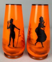 A PAIR OF ORANGE CZECHOSLOVAKIAN GLASS SPILL VASES WITH SILHOUETTES OF A GENTLEMAN AND A LADY (2),
