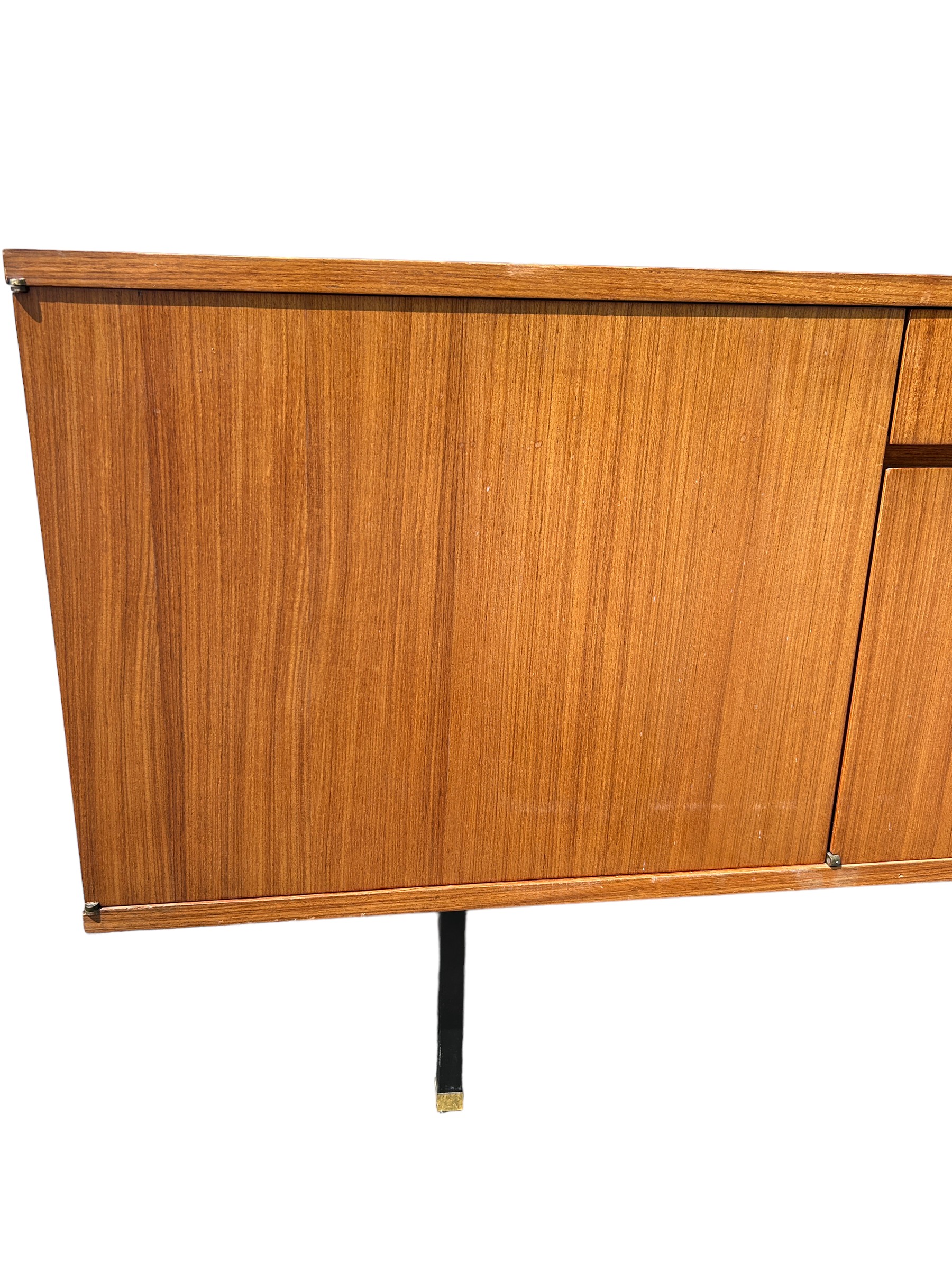 A MID CENTURY TEAK SIDEBOARD, four opening compartments and two central drawers. The compartments - Image 3 of 10