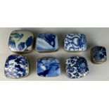 A COLLECTION OF SEVEN CHINESE WHITE METAL BOXES WITH BLUE AND WHITE PORCELAIN LIDS (7) 20th Century