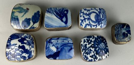 A COLLECTION OF SEVEN CHINESE WHITE METAL BOXES WITH BLUE AND WHITE PORCELAIN LIDS (7) 20th Century