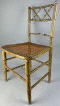 A REGENCY FAUX BAMBOO SIDE CHAIR WITH CANED SEAT 80cm H