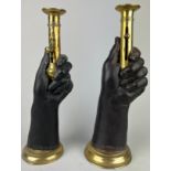 A PAIR OF HIGHLY UNUSUAL FRENCH BRASS CANDLESTICKS IN THE FORM OF HANDS 35cm H