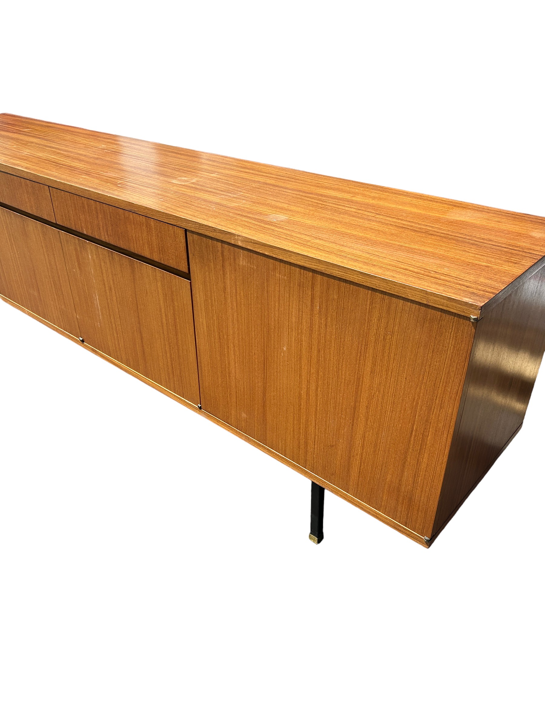 A MID CENTURY TEAK SIDEBOARD, four opening compartments and two central drawers. The compartments - Image 6 of 10