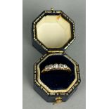 AN 18CT GOLD FIVE DIAMOND ENGAGEMENT RING, in blue case.