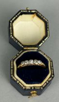 AN 18CT GOLD FIVE DIAMOND ENGAGEMENT RING, in blue case.