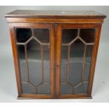AN EDWARDIAN TABLE TOP CABINET WITH PARQUETRY INLAY BORDER, two hinged doors opening to reveal one