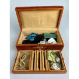 A BROWN LEATHER JEWELLERY BOX CONTAINING VARIOUS JEWELLERY, Mostly costume jewellery, silver