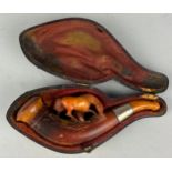 AN AMBER MEERSCHAUM PIPE WITH A HORSE, in a case. 11cm L