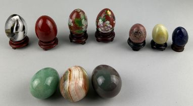 A GROUP OF STONE AND CLOISSONE EGGS ON STANDS (10)