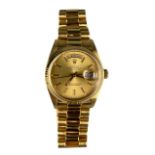 A GENTLEMAN'S 18CT GOLD ROLEX OYSTER PERPETUAL DAY-DATE WRISTWATCH, in working order. Insurance