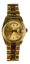 A GENTLEMAN'S 18CT GOLD ROLEX OYSTER PERPETUAL DAY-DATE WRISTWATCH, in working order. Insurance