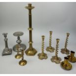 A COLLECTION OF BRASS CANDLESTICKS, To include two pairs of brass spiral candlesticks and others.