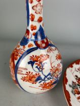 A JAPANESE IMARI BOTTLE AND PLATE (2)