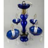 A BLUE MURANO GLASS FOUR ARM CHANDELIER WITH CRYSTAL DROPS, 50cm drop