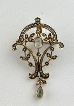 A LATE GEORGIAN OR EARLY VICTORIAN PENDANT OF FLORAL AND LEAF DESIGN, set with a central oval cut