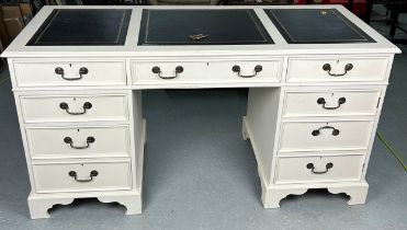 A 19TH C STYLE PEDESTAL DESK, white painted wood with black leather gilt embossed surface top, three