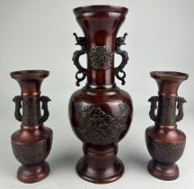 A SET OF THREE CHINESE TWIN HANDLED VASES ALONG WITH THREE FRAMED CHINESE CURRENCY