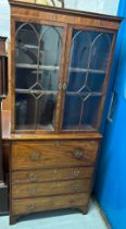 A 19TH C SECRETAIRE BOOKCASE, mahogany with veneered inlay detail, glass cabinet doors, brass