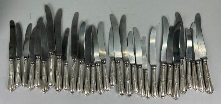 A QUANTITY OF STAINLESS STEEL KNIVES WITH SILVER HANDLES BY JOSEPH RODGERS (30)