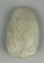 A CHINESE WHITE JADE CARVING WITH FLOWERS AND BAMBOO SHOOTS