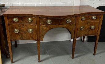 A GEORGIAN SERPENTINE SIDEBOARD WITH MARQUETRY LINE INLAY, Four drawers with brass handles, raised