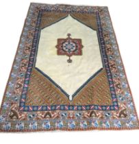 A LARGE TURKISH CARPET, second half 20th Century. 250cm x 170cm Stain to centre, and has been in