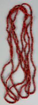 A PAIR OF ANTIQUE DEEP RED CORAL NECKLACES, possibly South African.
