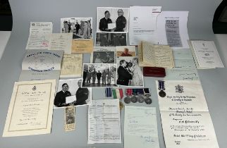 A FASCINATING COLLECTION OF MEDALS, RECORDS, PHOTOGRAPHS, MAPS, DIARY ENTRIES AWARDED TO ROYAL AIR