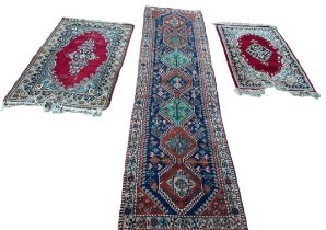 A GROUP OF THREE 1970'S PERSIAN RUGS (3)