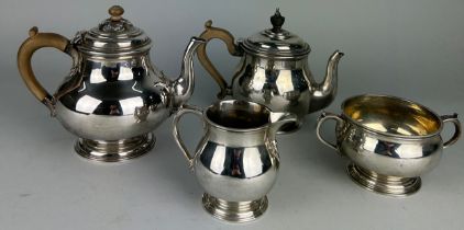 A LONDON SILVER TEA SERVICE MOSTLY BY RICHARD COMYNS, Comprising a tea pot, milk pail and sugar bowl