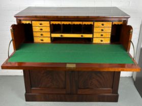 A LARGE VICTORIAN FLAME MAHOGANY BUREAU, The fall front opening to reveal a fitted interior with