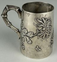 A CHINESE EXPORT SILVER CUP MOST PROBABLY BY HUNG CHONG OF SHANGHAI, Decorated with blossoming