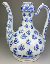 AN OTTOMAN KUTHAHYA OR JUG BLUE AND WHITE GLAZED, 22.5cm h