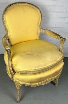 A FRENCH LOUIS XVI STYLE FAUTEUIL WITH YELLOW UPHOLSTERED FABRIC AND CUSHION