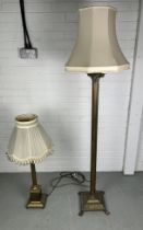 A LARGE CORINTHIUM COLUMN BRASS STANDARD LAMP, ALONG WITH A SIMILAR TABLE LAMP (2)