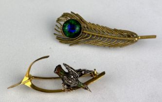 A 15CT ANTIQUE GOLD BIRD BROOCH SET WITH SMALL DIAMONDS, Along with a similar yellow metal peacock