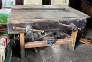 A LARGE VINTAGE WORKBENCH ALONG WITH TOOLS AND THREE UNRELATED MARBLE TOPS (Qty)
