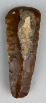 A NEOLITHIC AXE HEAD FROM CAMBRIDGESHIRE, 13cm L A large, finely flaked and part polished flint