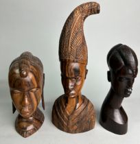 A COLLECTION OF CARVED WOOD AFRICAN HEADS, various woods, ranging from 33cm h (largest) and 20cm