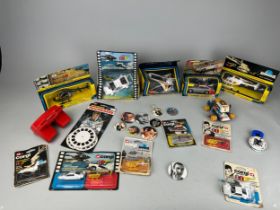A COLLECTION OF JAMES BOND CORGI TOYS AND BADGES (QTY) To include James Bond 007 The Spy Who Loved