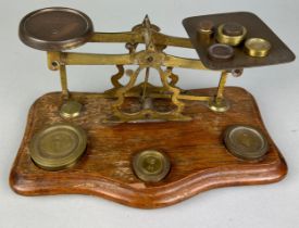 A SET OF POSTAL SCALES WITH BRASS WEIGHTS