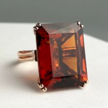 A VERY LARGE 49.75CT WEIGHT BRAZILIAN MADEIRA CITRINE SET IN 9CT ROSE GOLD RING, An octagonal step