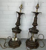 A PAIR OF METAL LAMPS, with hanging glass detail, 75cm h (each) Both lamps are broken.