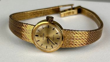 AN OMEGA GENEVE 14CT GOLD LADIES WRISTWATCH Weight: 24.7gms
