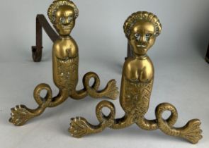 A PAIR OF 19TH CENTURY BRASS FIREDOGS DEPICTING A MALE FIGURE OF A SEA GOD